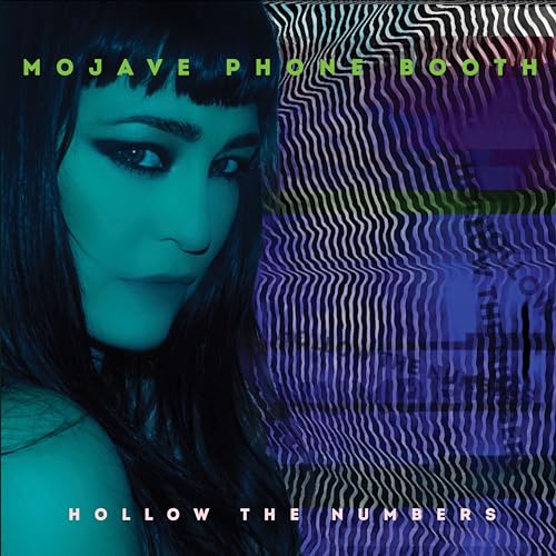 Vinyl album cover featuring a woman’s face with swirling blue and purple background.