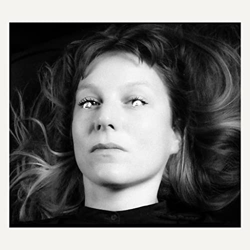 Black and white portrait of Hedvig Mollestad with flowing hair.
