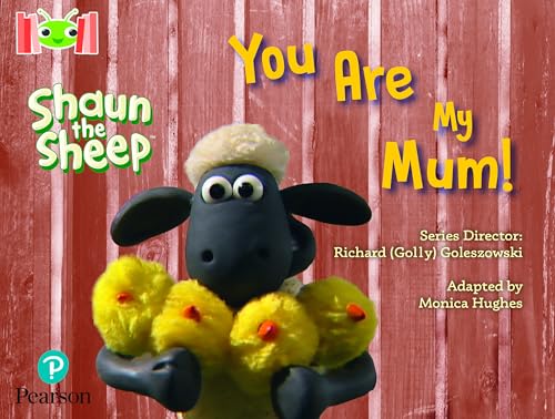 Shaun the Sheep holds three yellow chicks against a red wooden background.