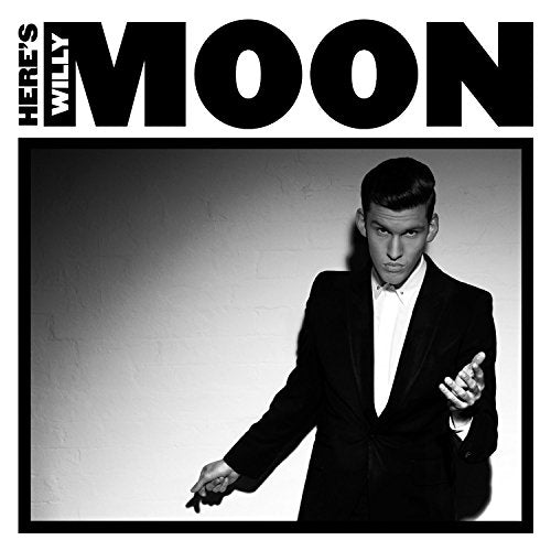 Black and white album cover featuring a man in a suit.