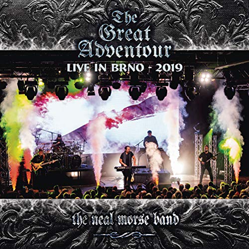 "Album cover featuring a band performing on stage with colorful smoke and audience."