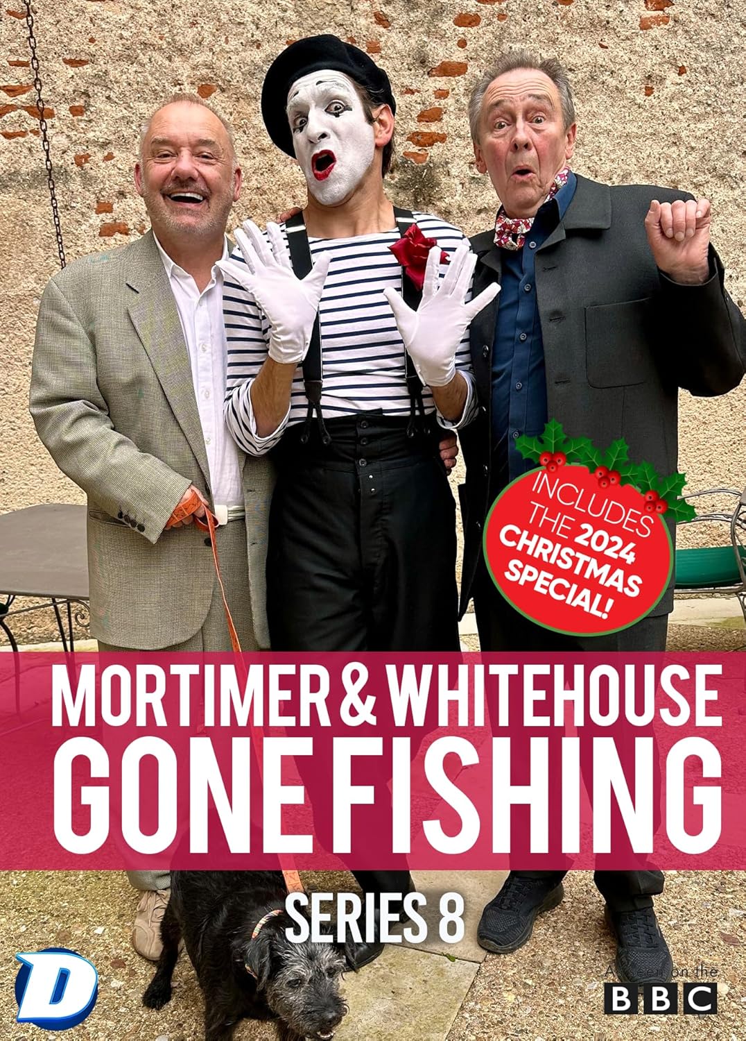 Bob Mortimer and Paul Whitehouse stand with a mime artist and a small dog.
