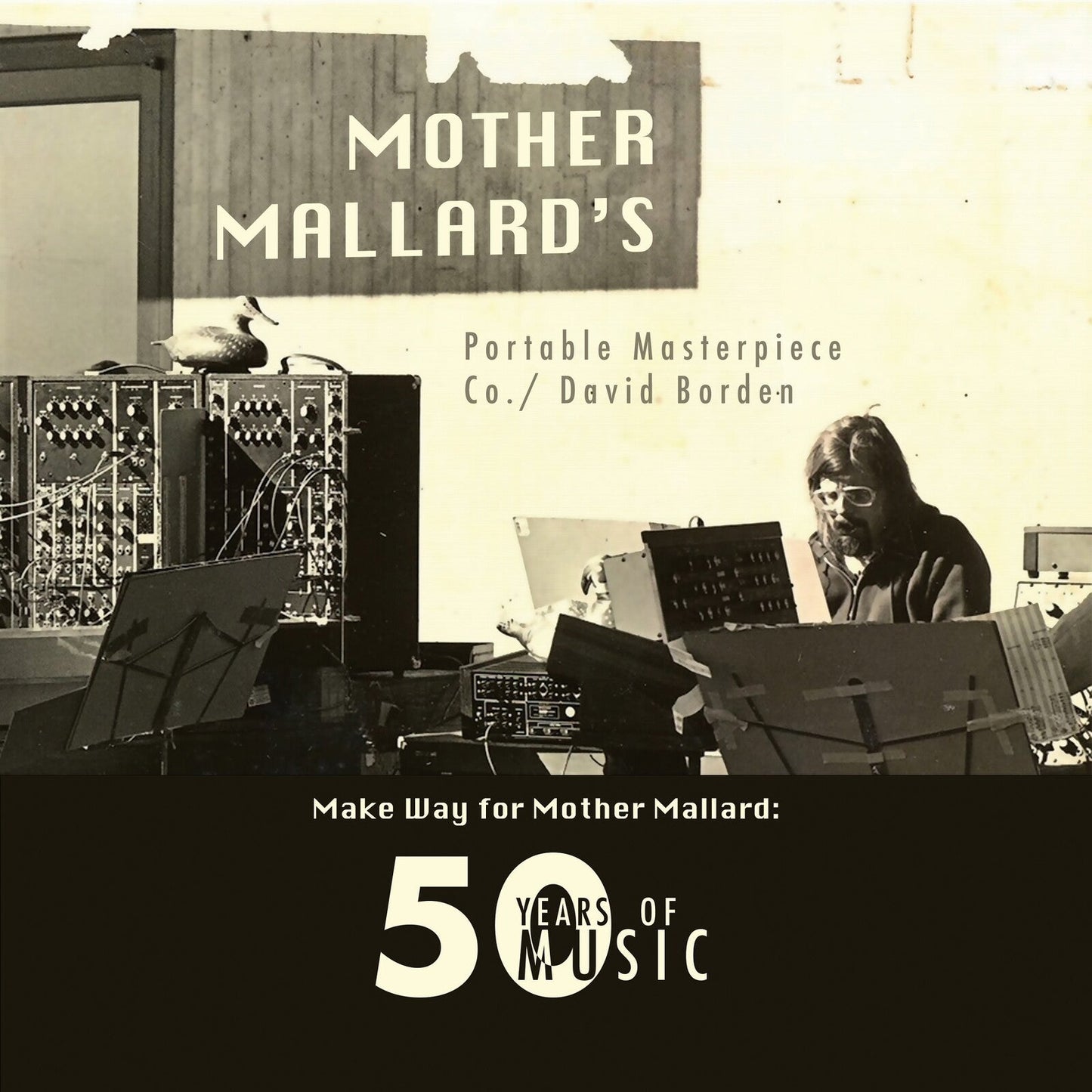 Black and white album cover featuring musicians with electronic equipment.