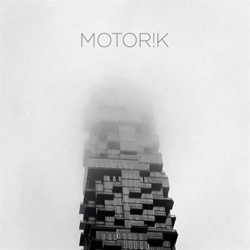 Black and white album cover with a skyscraper disappearing into clouds.