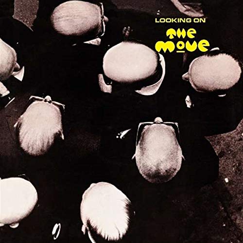 Overhead view of several men in dark suits with the text Looking On The Move.