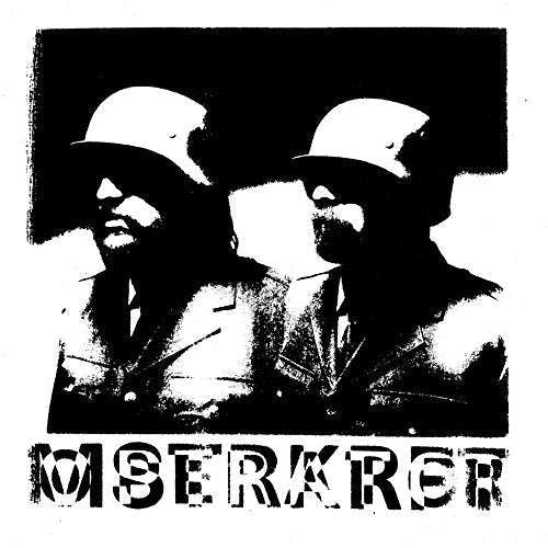 Black and white CD cover with two figures in helmets and distorted text.