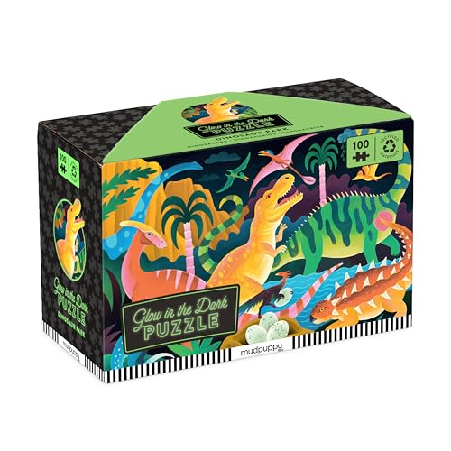 Box for 100-piece glow-in-the-dark dinosaur puzzle with colorful illustrations.