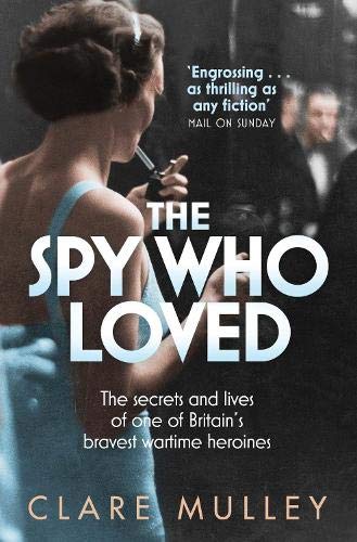 Book cover: woman in blue dress, seen from behind, title “The Spy Who Loved”.