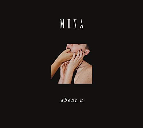 MUNA “About U” CD cover: face and hands against a black background.