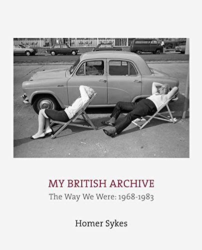 Black and white photo of two people relaxing by cars, book cover.