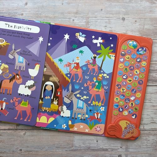 Open children’s Bible book with Nativity scene and sound buttons.