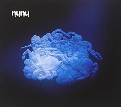 Blue album cover featuring a chaotic, sculpted scene of figures and animals.