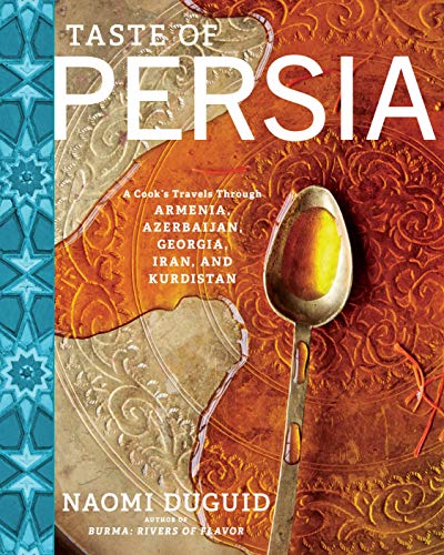 Cookbook cover with silver spoon on ornate, textured golden background.
