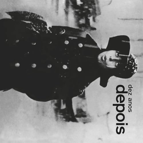 Black and white album cover featuring a person in a coat and hat.