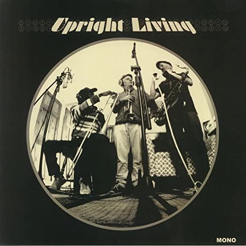 Three musicians playing instruments in a circular frame under the title Upright Living.