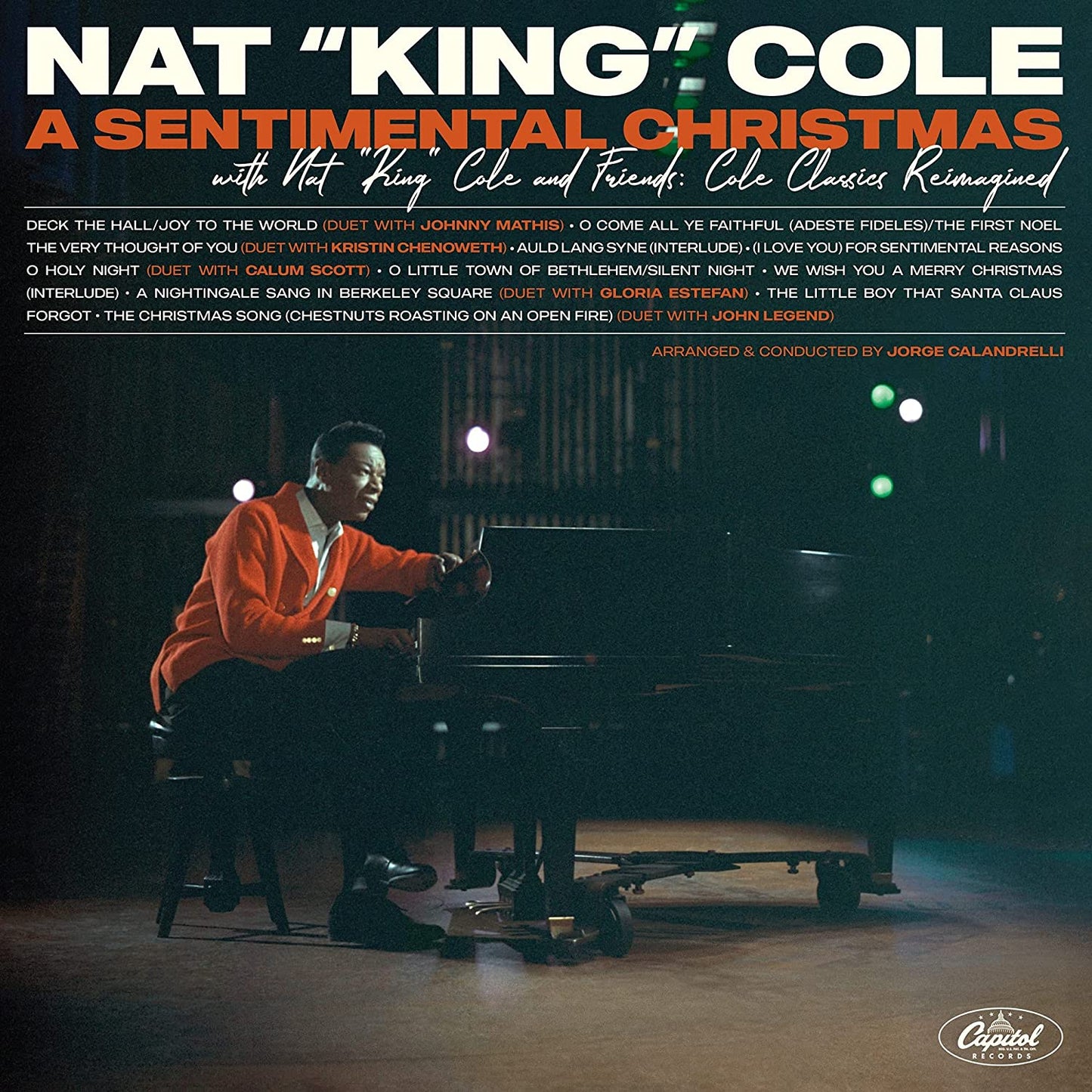 Nat King Cole album cover featuring Cole at a piano, red and green text.