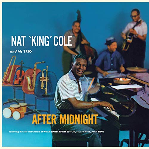Nat King Cole at a piano with his trio, album cover art.