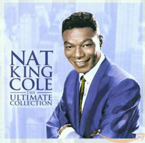 Album cover featuring Nat King Cole in a blue suit, smiling against a blue background.