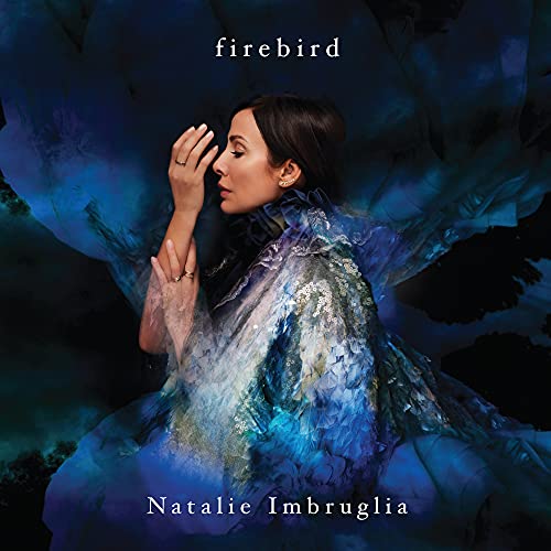 Natalie Imbruglia album cover, “Firebird”, featuring a woman in blue tones.