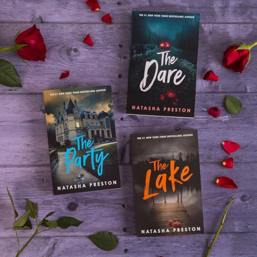 Three Natasha Preston books on a purple wooden surface with scattered red rose petals.