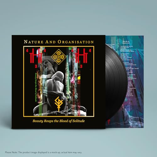 Vinyl record with album cover featuring a statue and abstract design.
