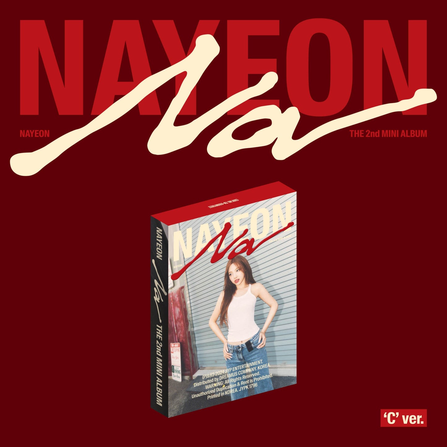 NAYEON's "NA" album cover: red background, silver cube, and stylized text.