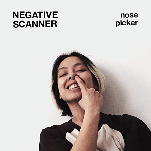 Person picking nose, album cover for Negative Approach’s “Nose Picker.”