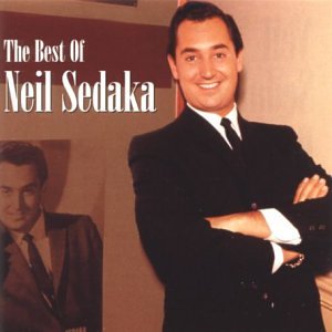 CD cover featuring a smiling portrait of Neil Sedaka in a suit.