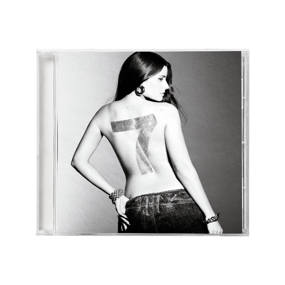 Black and white CD cover featuring Nelly Furtado with a number seven on her back.