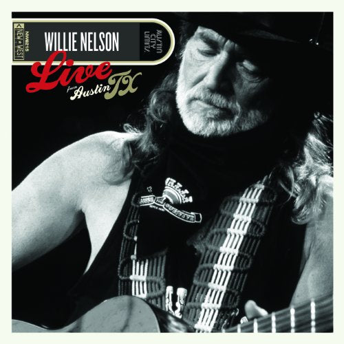 Black and white album cover featuring Willie Nelson with his guitar.
