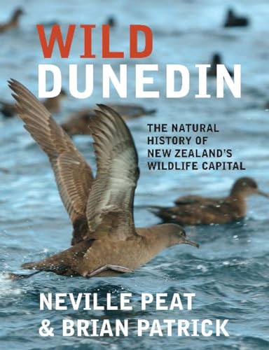 Book cover featuring seabirds in flight and text: "Wild Dunedin".