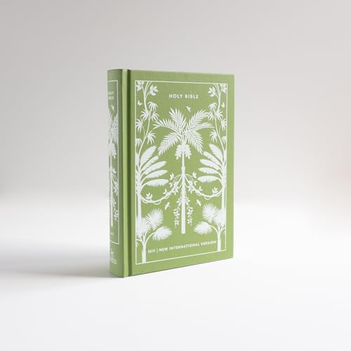 Green clothbound NIV Holy Bible with white botanical palm tree illustrations on the cover.