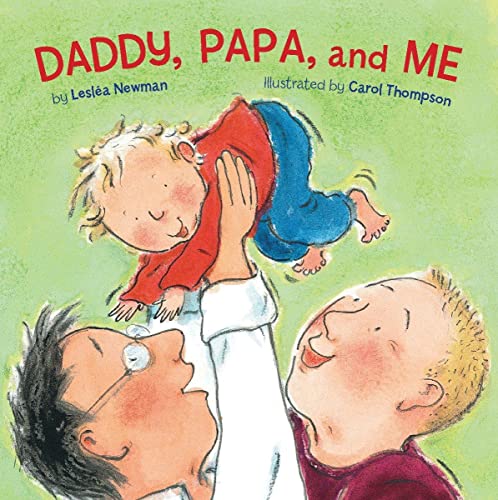 Two fathers lift a smiling toddler into the air on a green background.