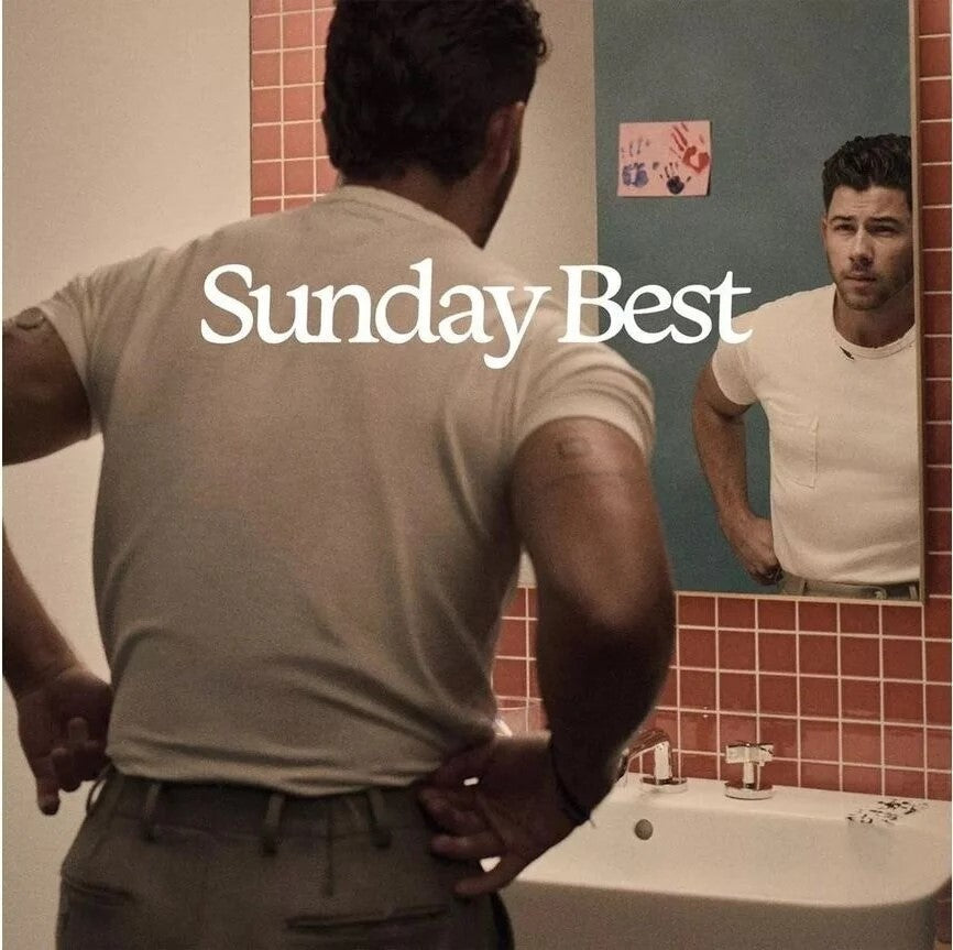 Nick Jonas album cover, "Sunday Best," showing a man in a bathroom.