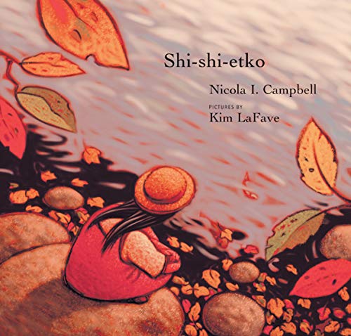 Book cover: child with hat among rocks and falling leaves.
