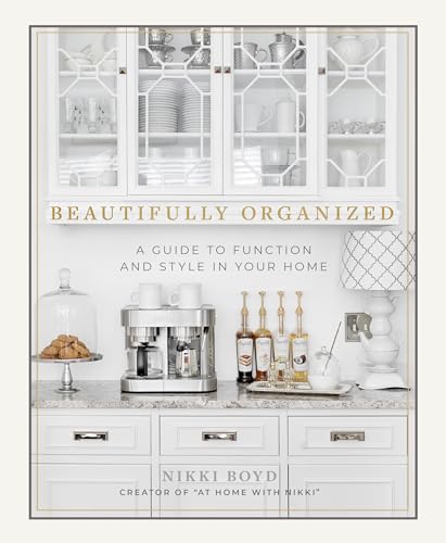 Book cover featuring a white kitchen cabinet filled with dishware.