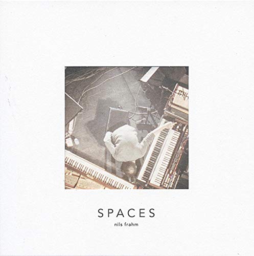 CD cover for Nils Frahm’s “Spaces” showing a pianist at keyboards.