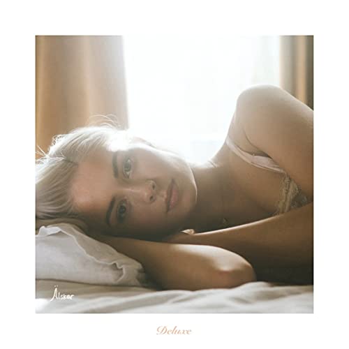 Nina Nesbitt album cover, “Alskar,” showing a blonde woman lying down.