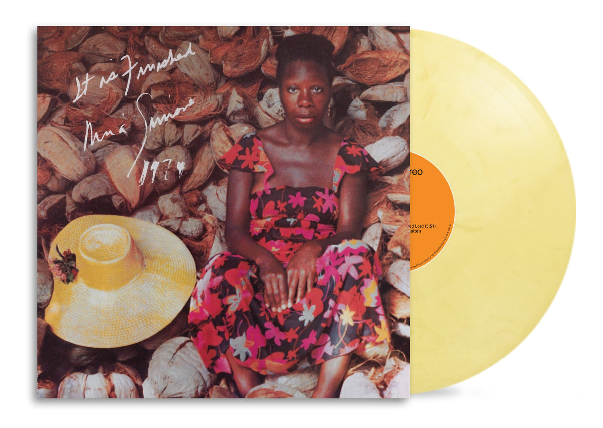 Nina Simone album cover with portrait and yellow vinyl record.