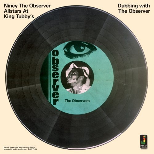 "Black vinyl record with blue label featuring a man's portrait and eye illustration."