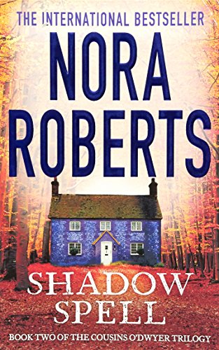 Book cover: “Shadow Spell” by Nora Roberts, featuring a blue cottage.