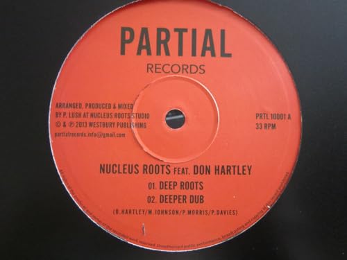 Red vinyl record label with black text: "Nucleus Roots Feat. Don Hartle.