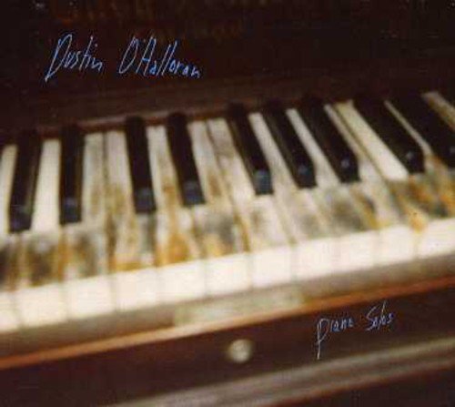 CD cover with piano keys and artist name "Dustin O'Halloran".