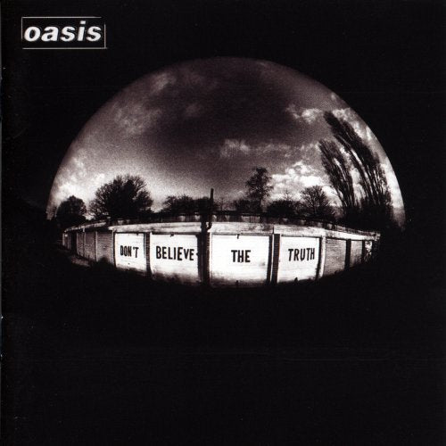 "Oasis album cover featuring a black-and-white image of a fence with 'Don't Believe The Truth' text."