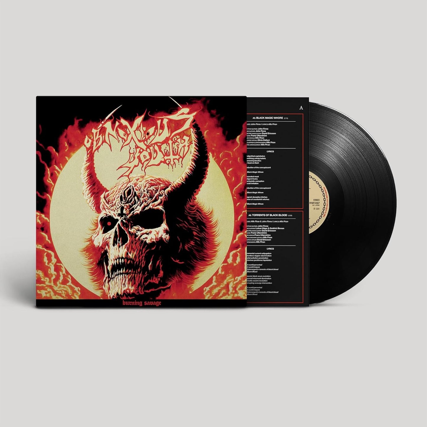 Vinyl record with cover art depicting a screaming face engulfed in flames.