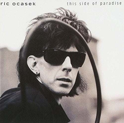 Black and white album cover featuring Ric Ocasek wearing sunglasses.