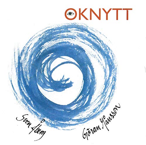 CD cover with a blue spiral design and handwritten signatures.