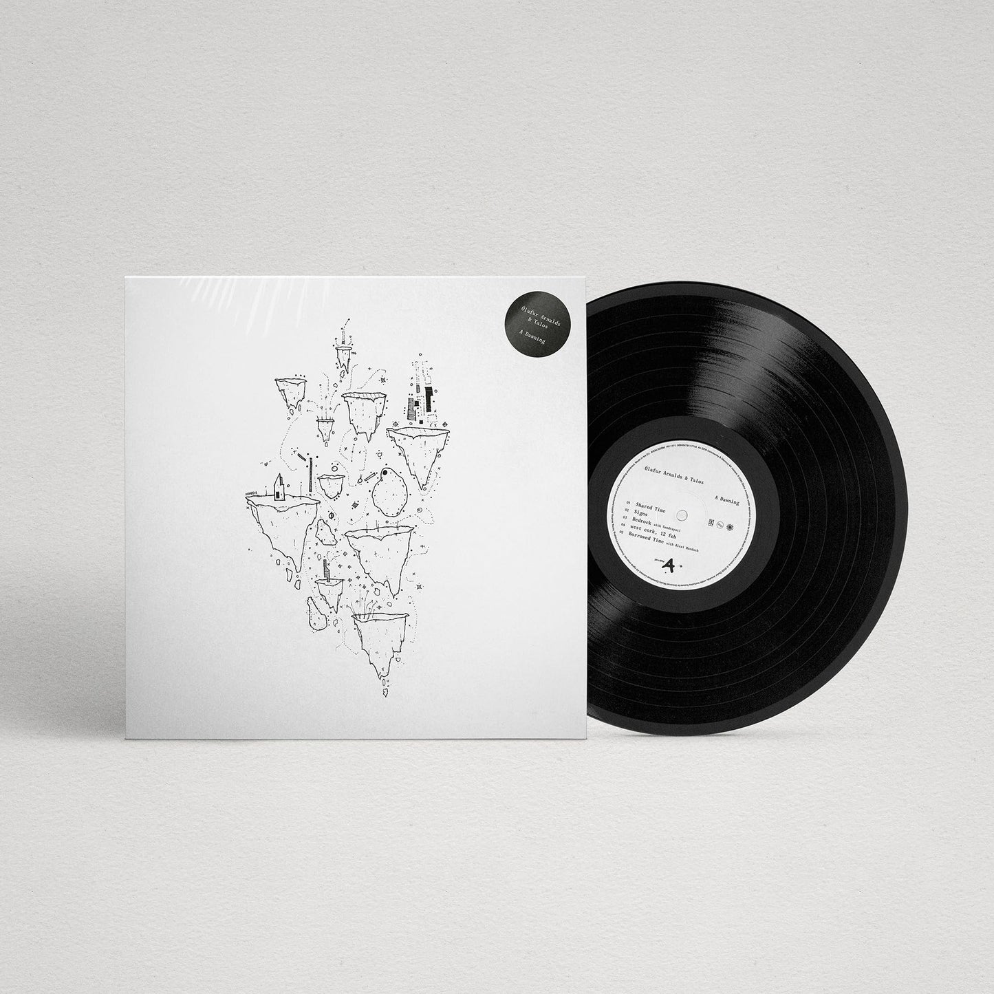 Vinyl record of Ólafur Arnalds’ “A Dawning” with sketched cover art.