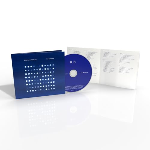 Ólafur Arnalds "re:member" CD open with booklet, blue cover, and disc.
