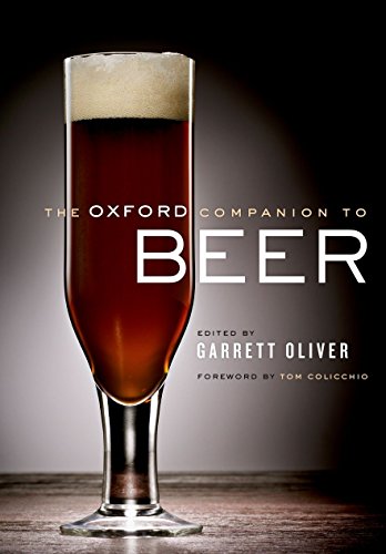 Book cover for "The Oxford Companion to Beer" with a glass of beer.